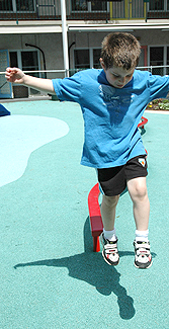 child enjoys playground